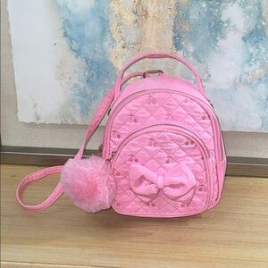Under One Sky Pink Quilted Backpack with Bow and Pom Pom